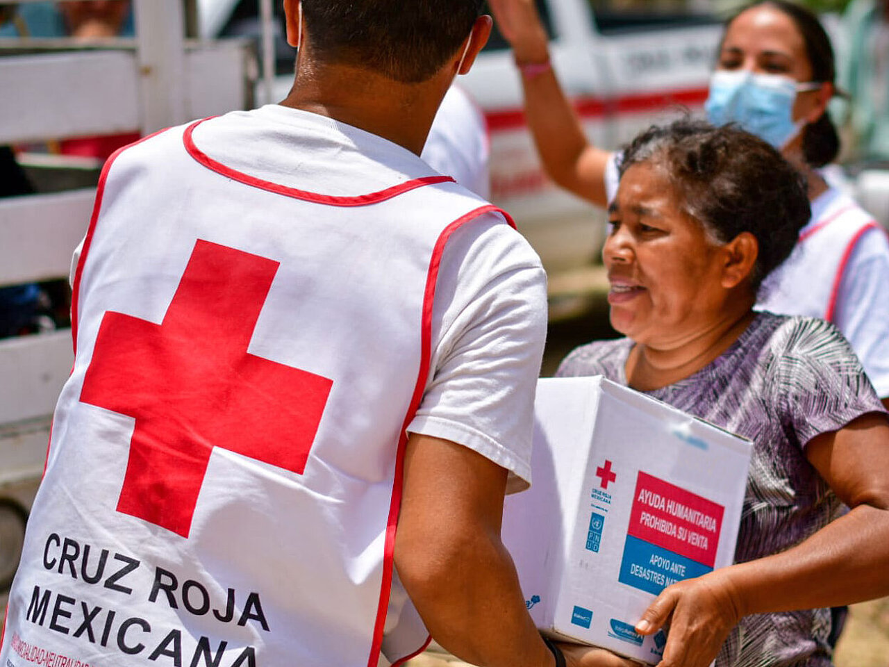 Senior woman receiving a box