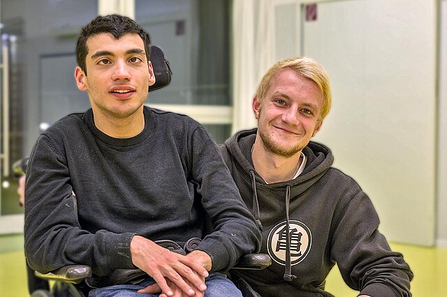 Patient mit Behinderung und Betreuer