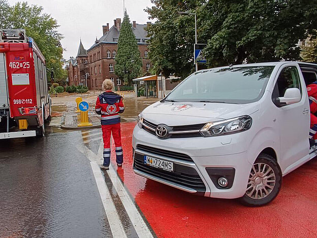 Red Cross volunteer in flood area