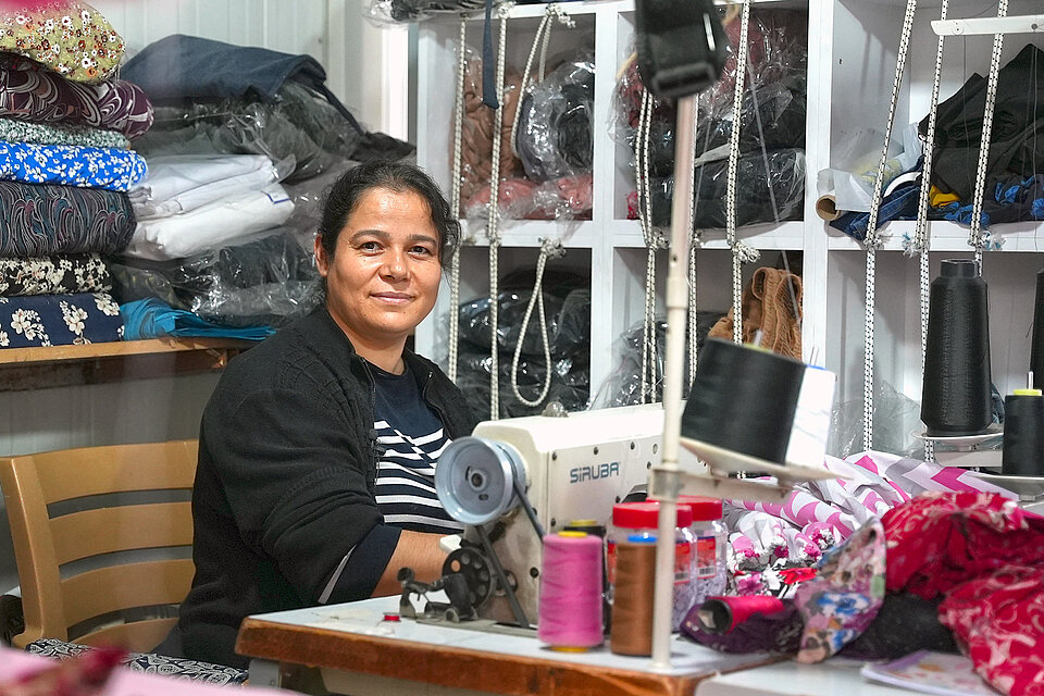 Woman in sewing room
