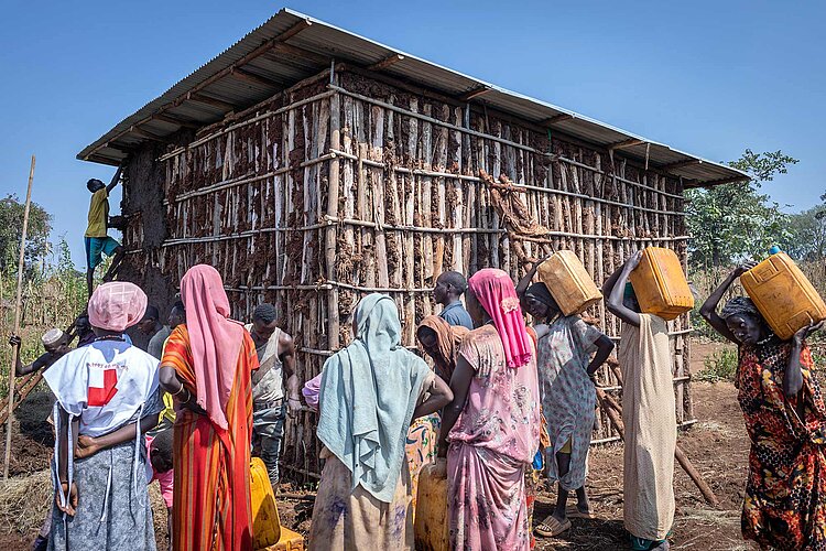 Helfende beim Hausbau