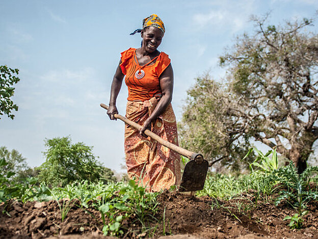 Woman in Mozambique working in garden