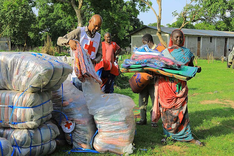 Woman receiving blanket