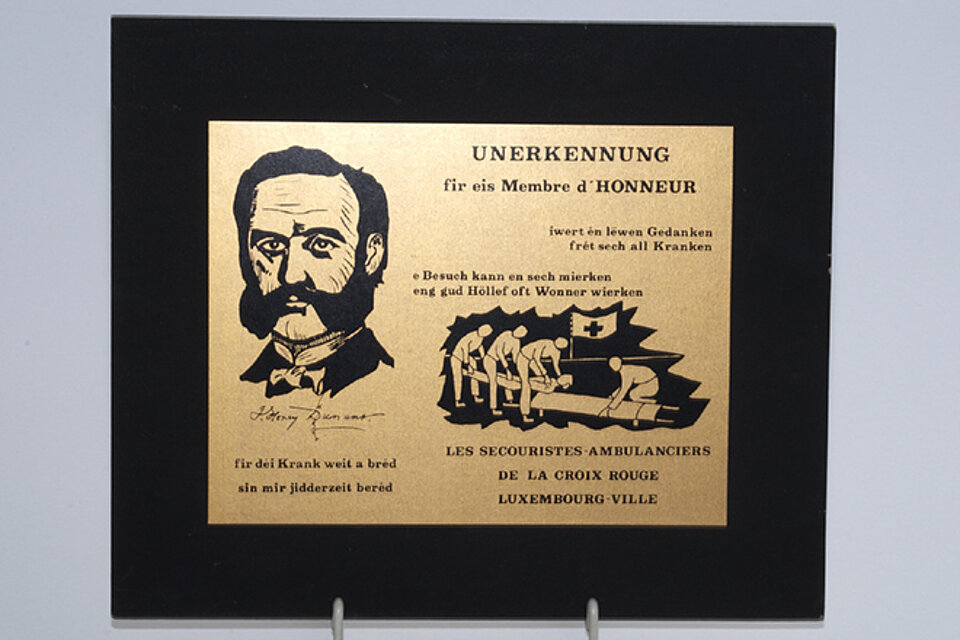 Anerkennungsschild mit Henry Dunant aus Luxemburg