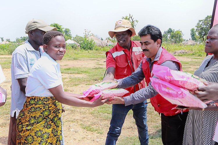 Woman receiving seeds
